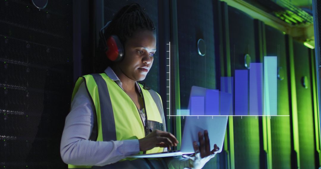 Female IT Technician Analyzing Data Visualization in Server Room