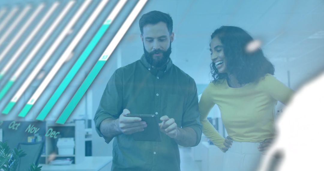 Colleagues Discussing Financial Data Analysis in Modern Office