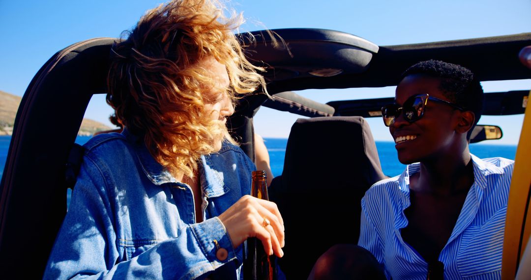 Friends Enjoying Summer Road Trip in Convertible by the Ocean - Free Images, Stock Photos and Pictures on Pikwizard.com