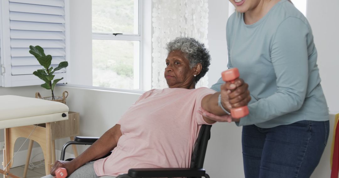 Physical Therapist Assisting Senior Woman with Exercises at Home - Free Images, Stock Photos and Pictures on Pikwizard.com