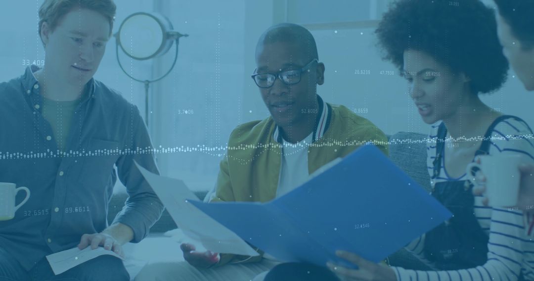 Team Collaboration in Modern Office Setting with Documents