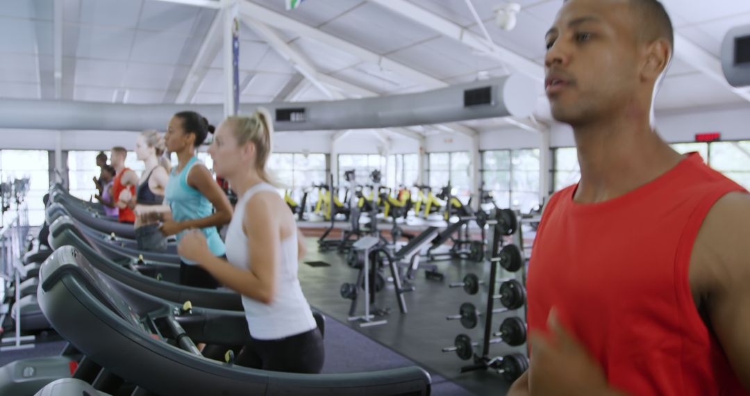 Men and Women Running on Treadmills in Modern Gym - Free Images, Stock Photos and Pictures on Pikwizard.com