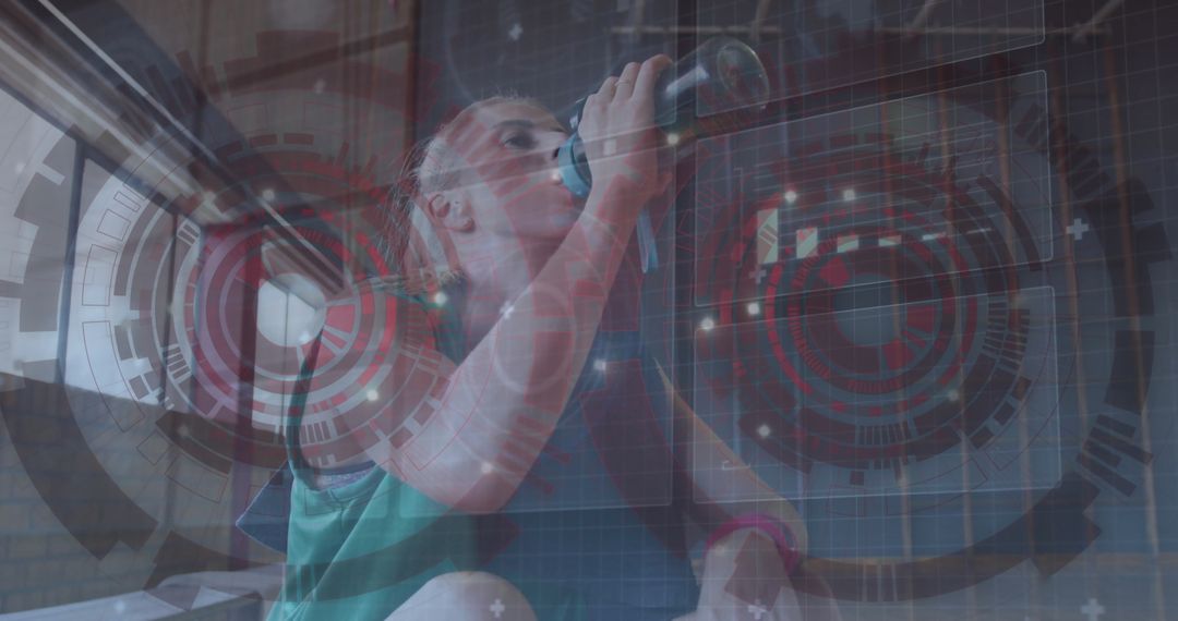 Woman in Green Tank Top Hydrating with Futuristic HUD Graphics