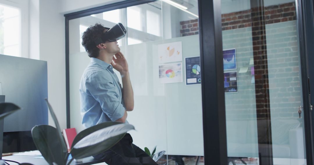 Engineer Experiencing Virtual Reality Technology in Modern Office - Free Images, Stock Photos and Pictures on Pikwizard.com