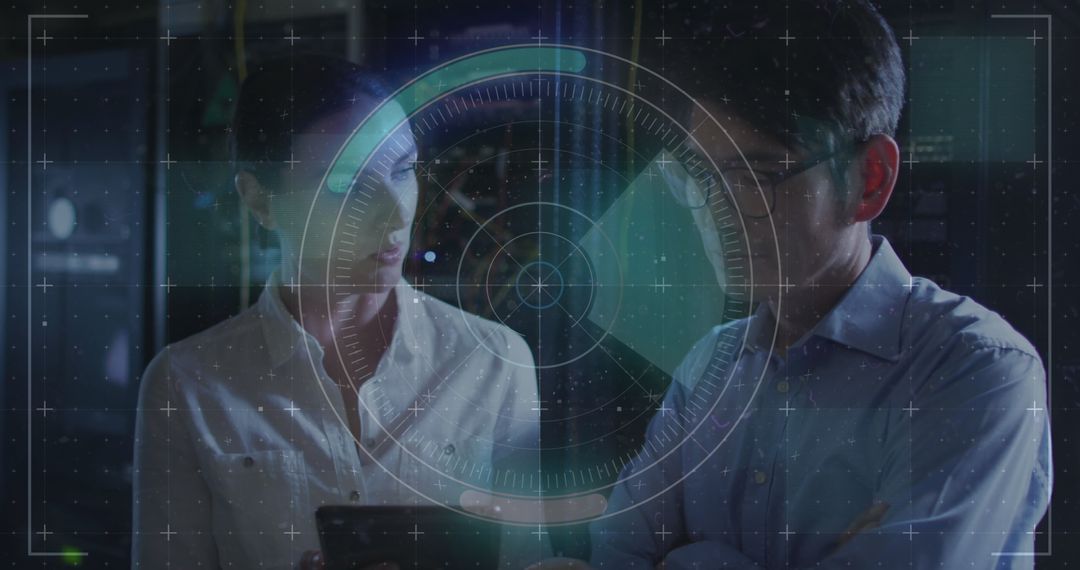 IT Engineers Analyzing Data on Transparent Interface