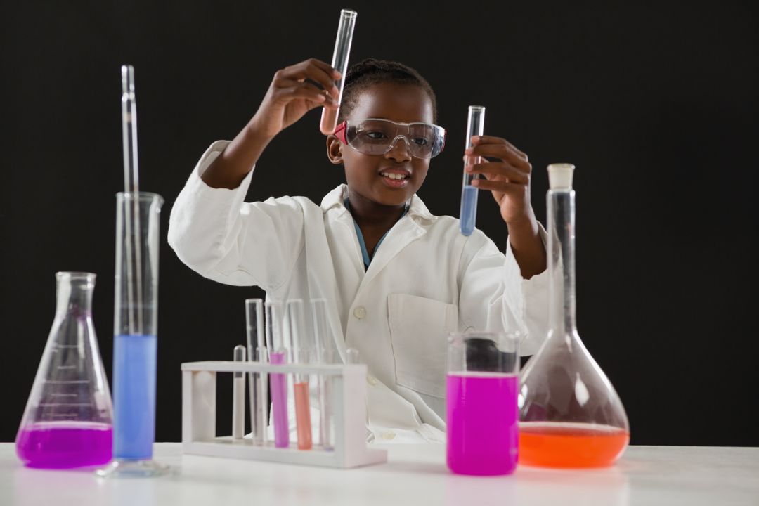 Young Scientist Conducting Chemical Experiment in Laboratory - Free Images, Stock Photos and Pictures on Pikwizard.com