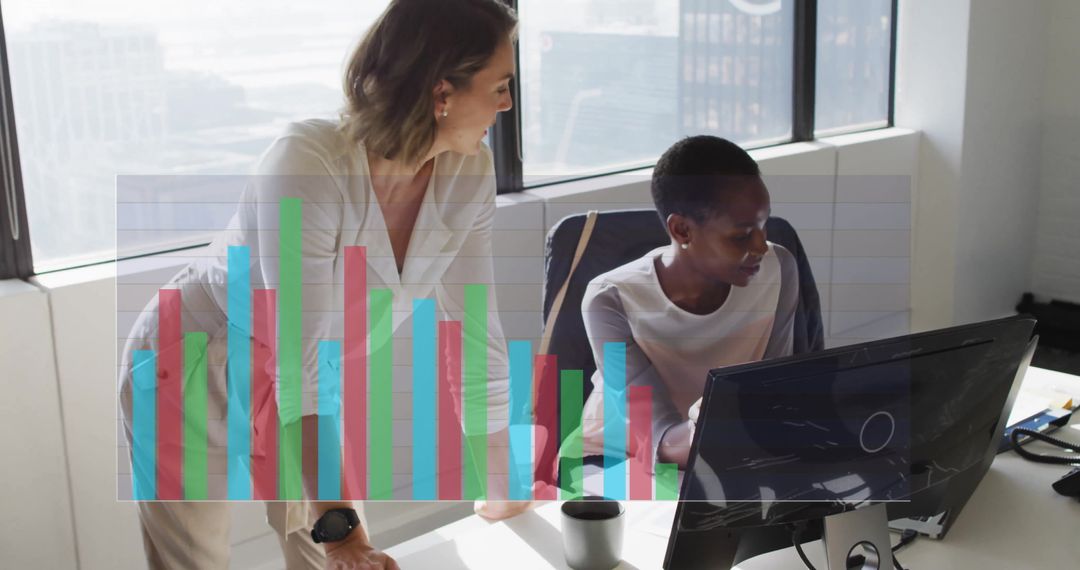 Diverse Team Analyzing Data on Computer in Bright Office