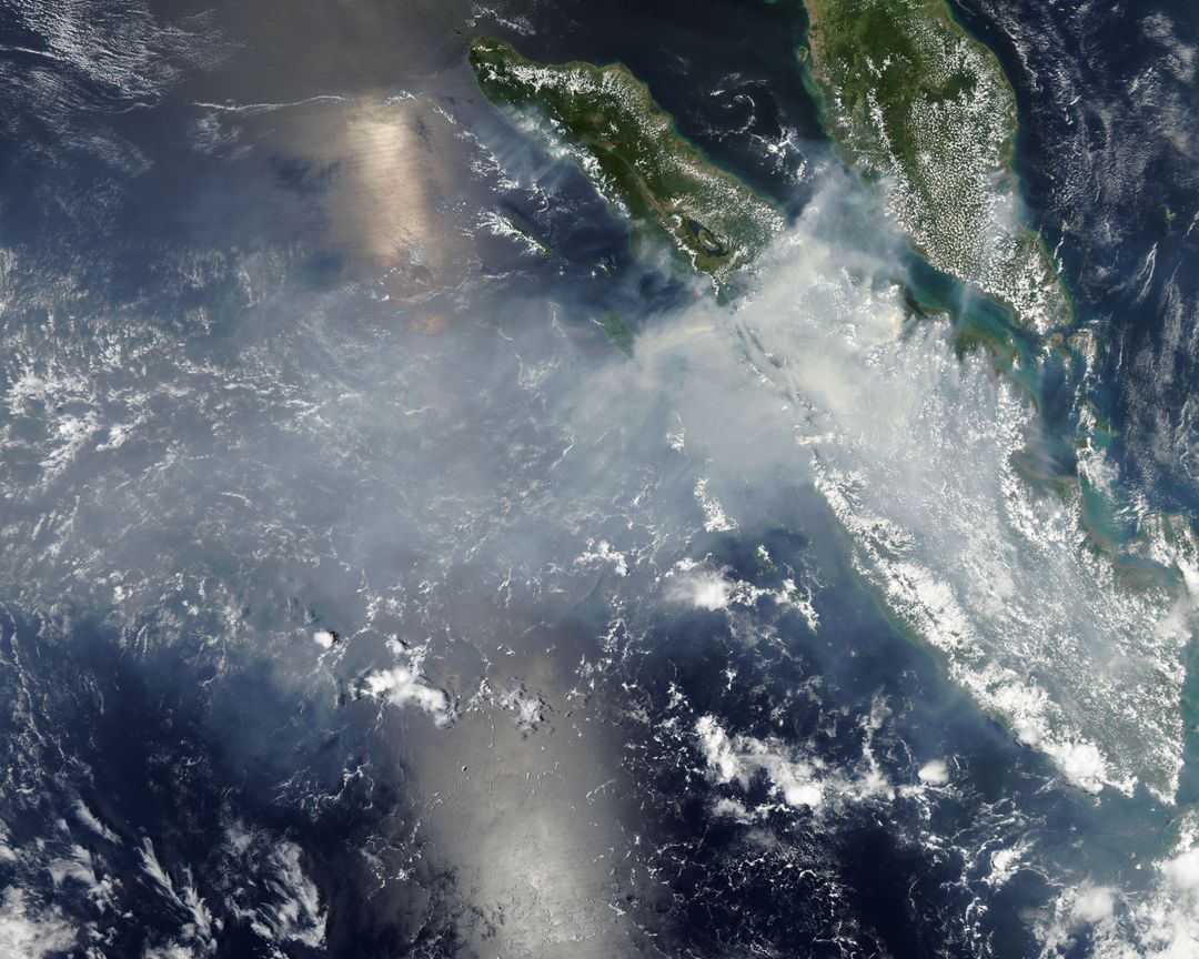 Satellite View of Smoke and Haze from Fires in Sumatra, March 2014 - Free Images, Stock Photos and Pictures on Pikwizard.com