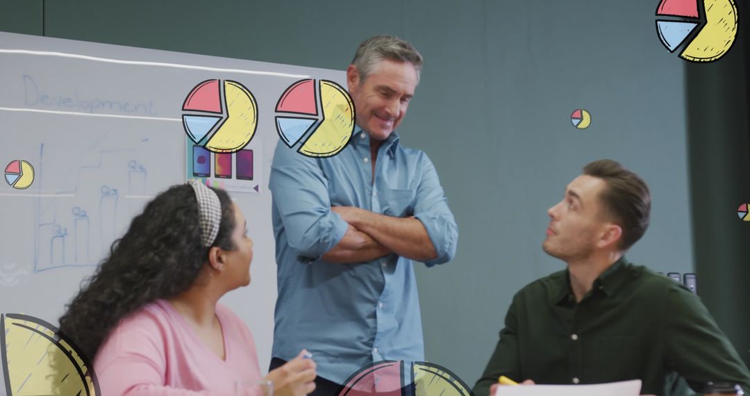 Colleagues Analyzing Data with Graph Elements in Modern Office