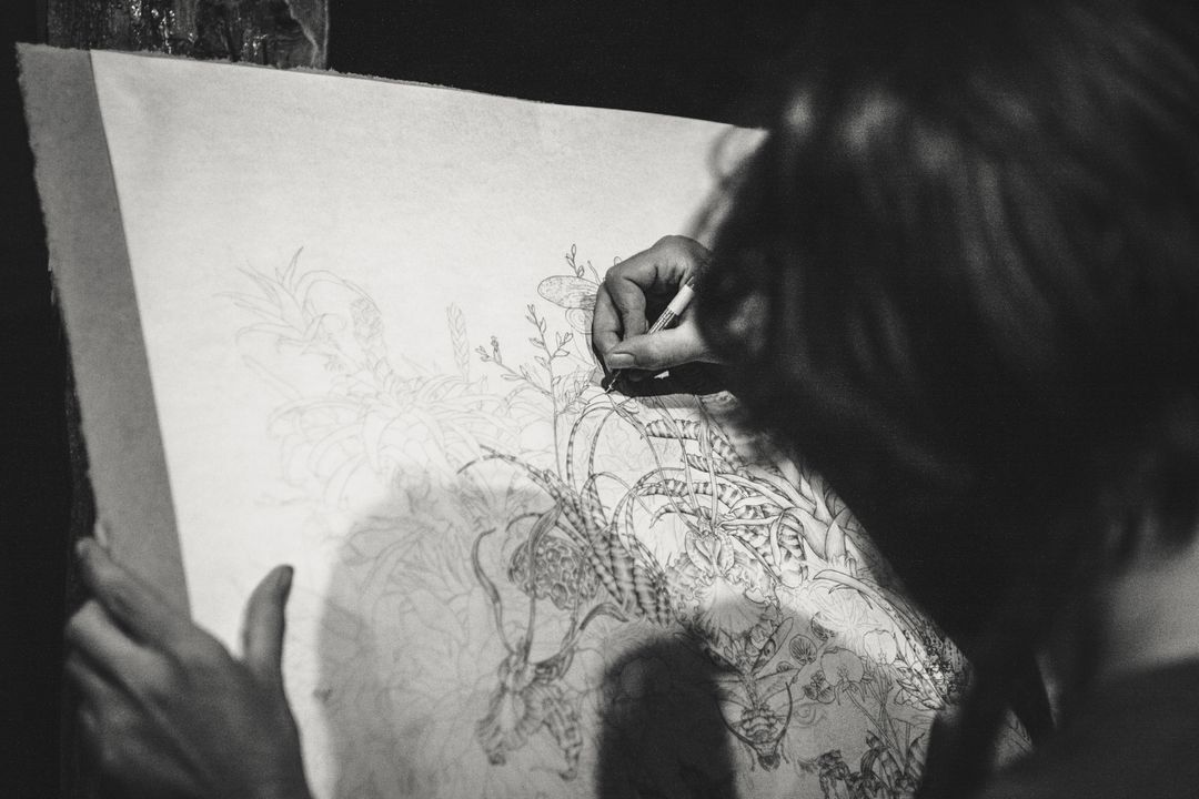 Artist Sketching Intricate Floral Design - Free Images, Stock Photos and Pictures on Pikwizard.com