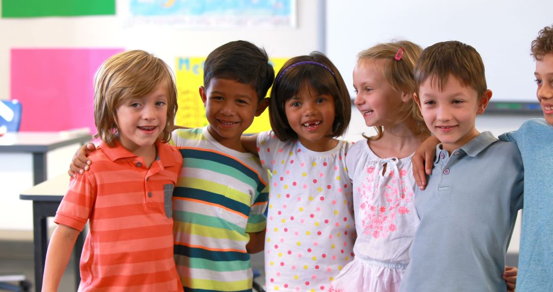 Diverse Group of Happy School Children Embracing in Classroom - Free Images, Stock Photos and Pictures on Pikwizard.com