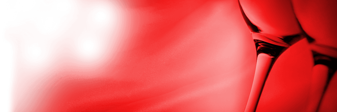 Transparent Champagne Flute Close-Up with Vibrant Red Liquid