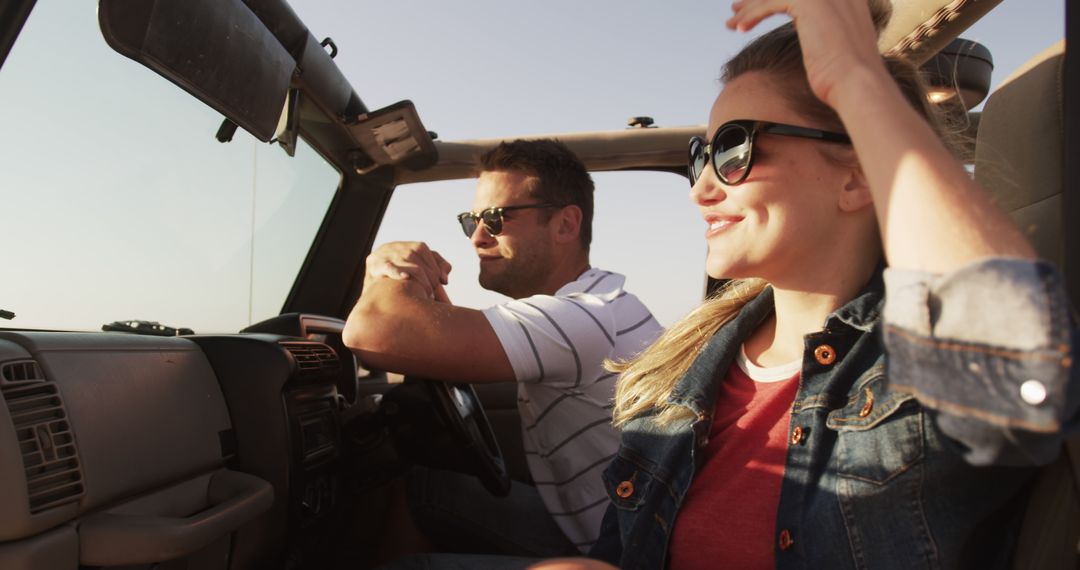 Couple Enjoying a Road Trip in Convertible - Free Images, Stock Photos and Pictures on Pikwizard.com