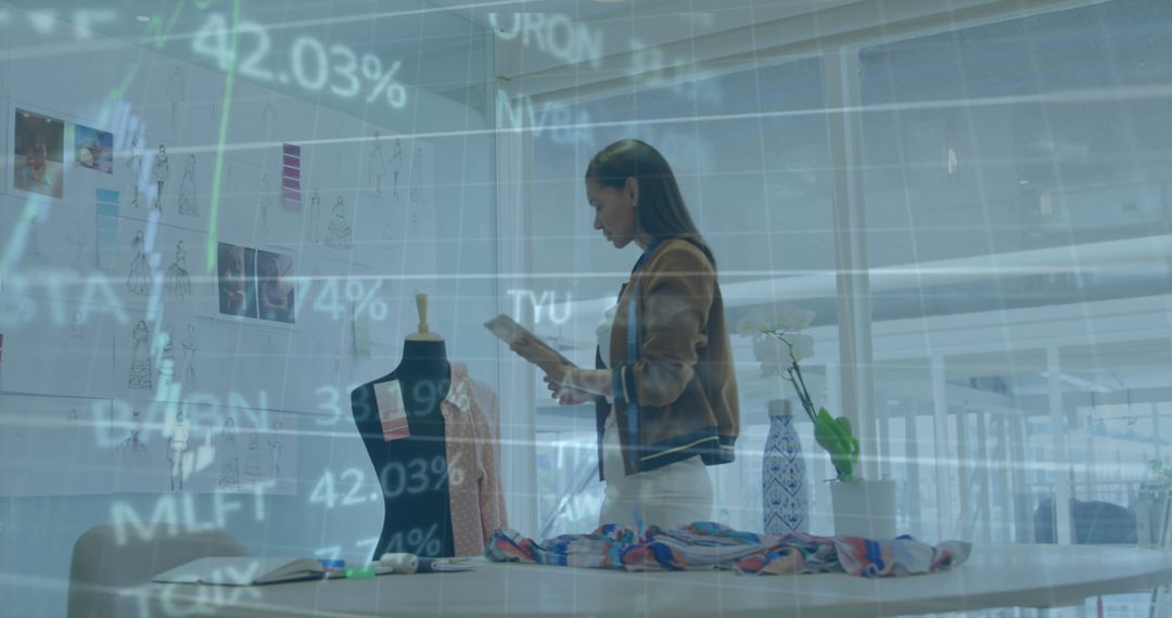Fashion Designer Analyzing Trends Amid Stock Market Graphics