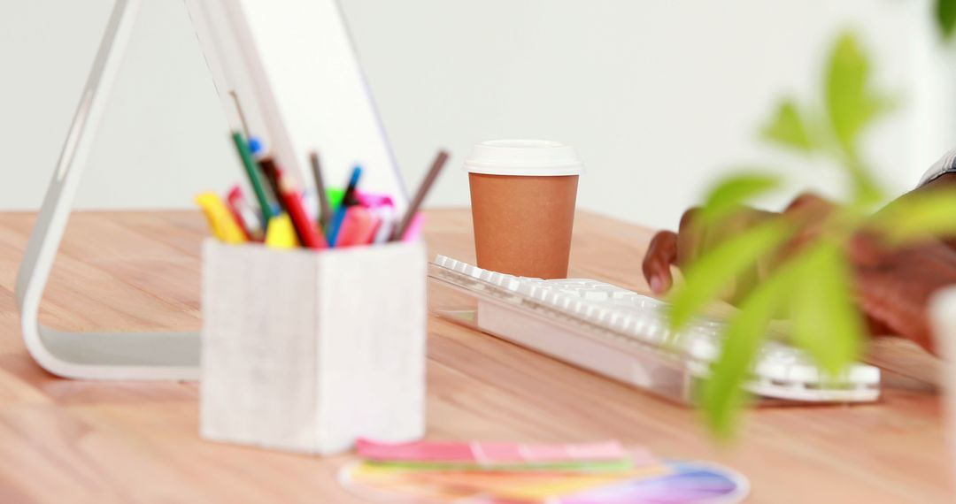 Creative Workspace with Colorful Supplies and Coffee Cup - Free Images, Stock Photos and Pictures on Pikwizard.com