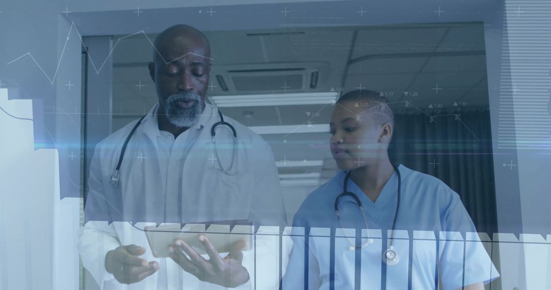 Doctors Team Collaborating with Tablet in Hospital Corridor