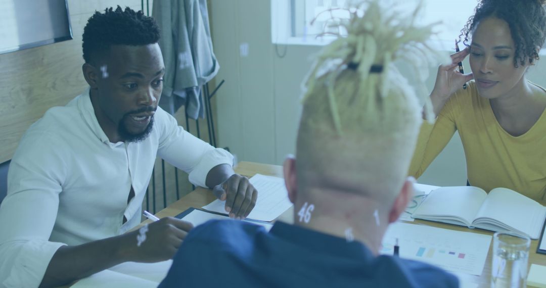 Collaborative Team Meeting in Modern Office Setting