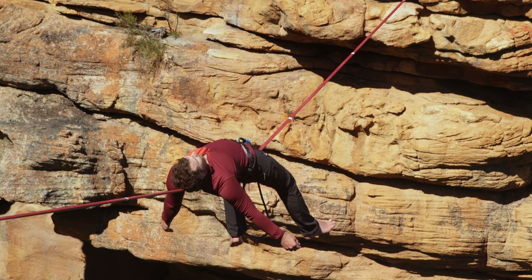 Man Resting in Hammock on Rocky Cliff Face during Adventure - Free Images, Stock Photos and Pictures on Pikwizard.com