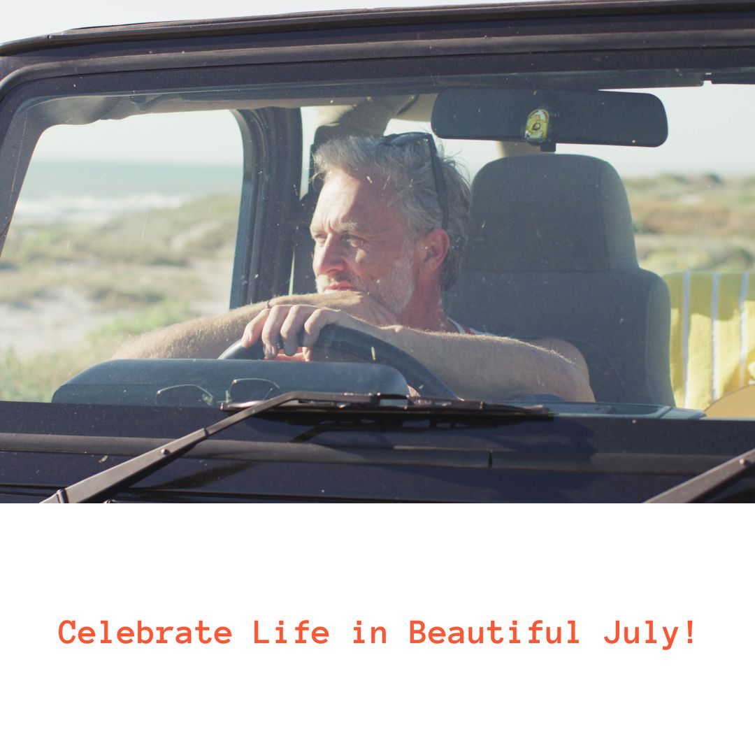 Senior Man Driving Open Car on Beach Celebrating Summer Vacation