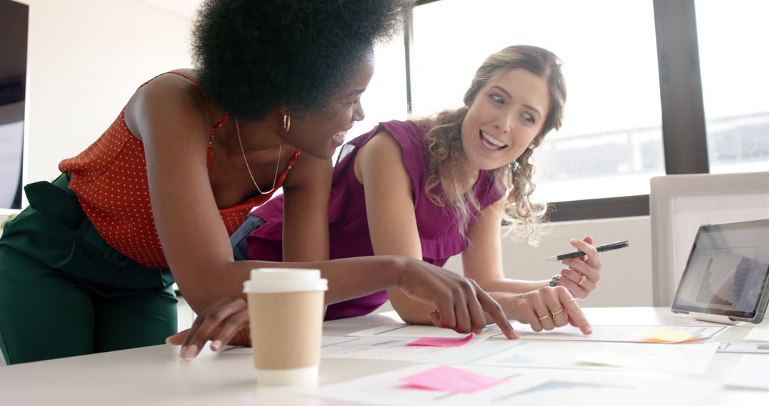 Diverse Female Colleagues Brainstorming in Office Meeting