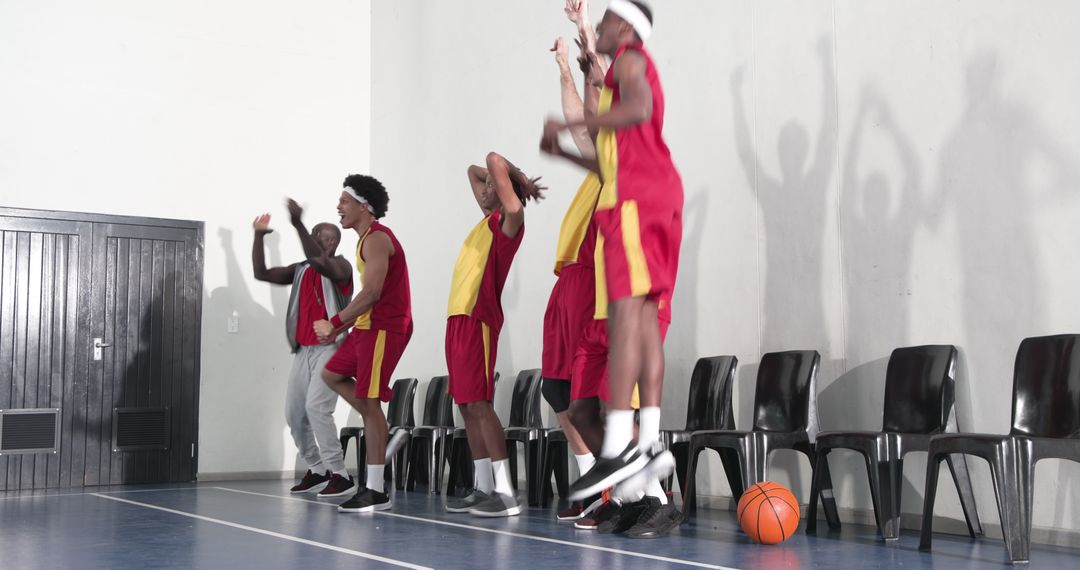 Enthusiastic Basketball Team Cheering on Gym Sideline