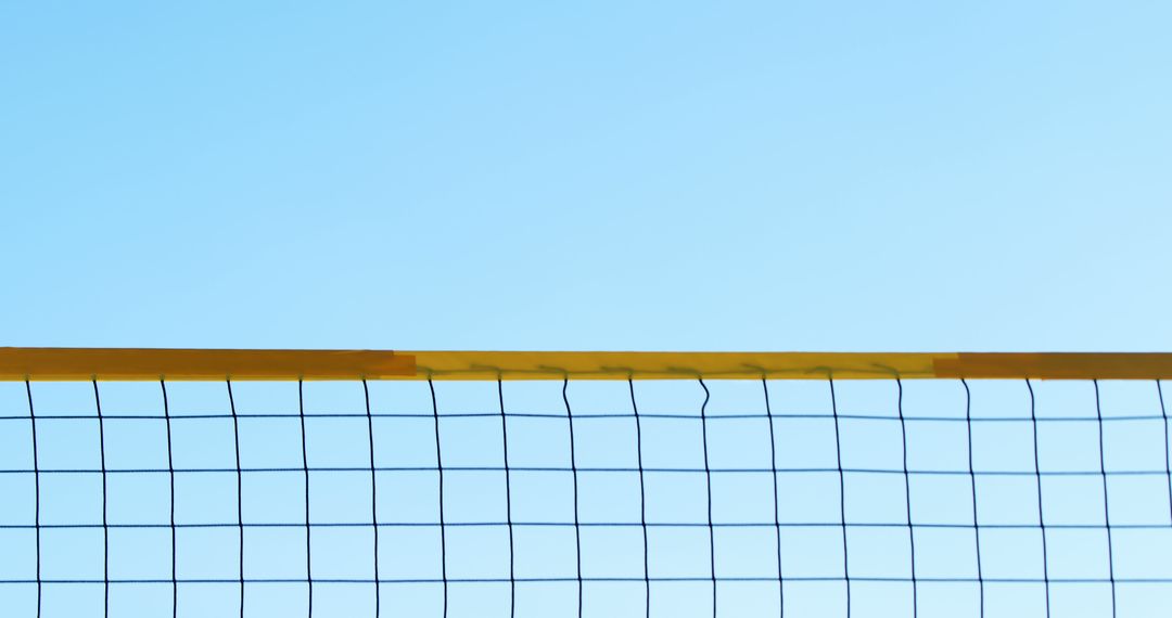 Volleyball net against a clear blue sky, with copy space - Free Images, Stock Photos and Pictures on Pikwizard.com