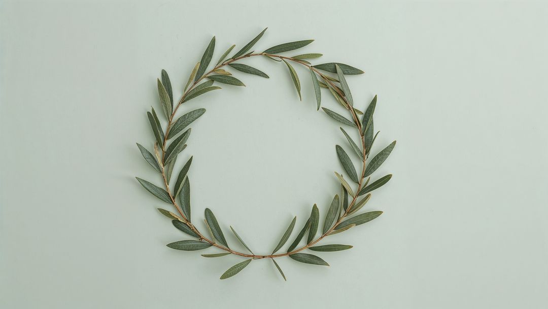 Minimalist Circular Olive Branch Wreath on Pale Green Background