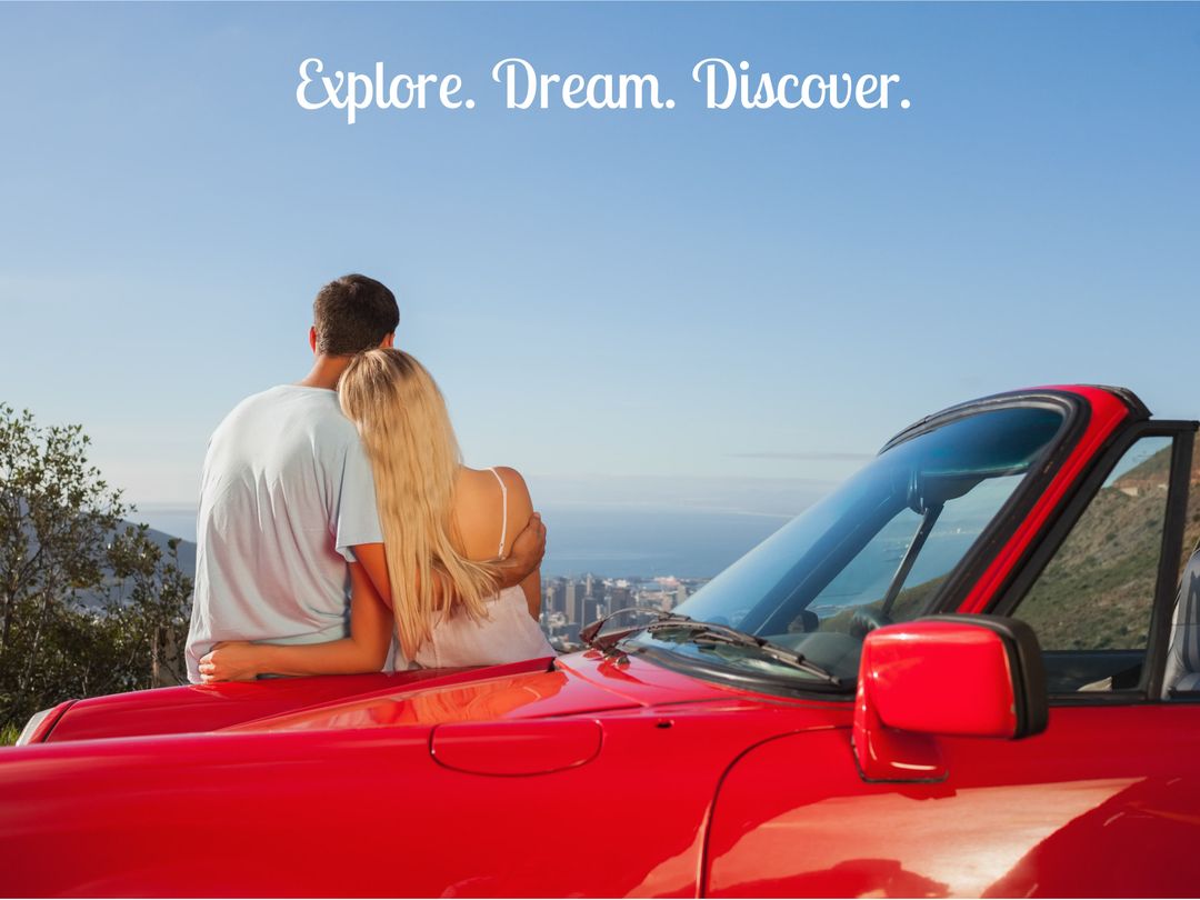 Couple Embracing Wanderlust with Red Car in Scenic Landscape