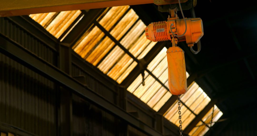 Old Rusty Industrial Chain Hoist in Warehouse Ceiling - Free Images, Stock Photos and Pictures on Pikwizard.com