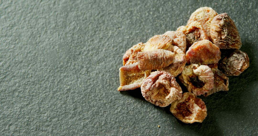 Close-up of dried berries on grey background 4K 4k - Free Images, Stock Photos and Pictures on Pikwizard.com