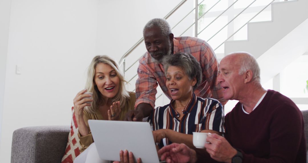 Group of Diverse Seniors Socializing and Using a Laptop - Free Images, Stock Photos and Pictures on Pikwizard.com