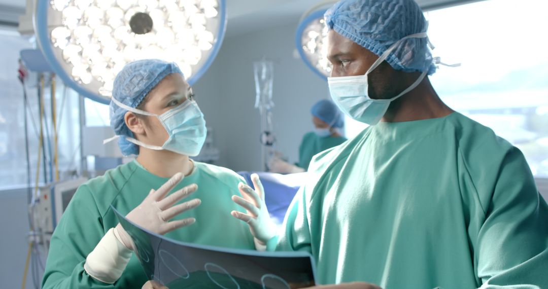 Surgical Team Analyzing X-ray in Operating Room