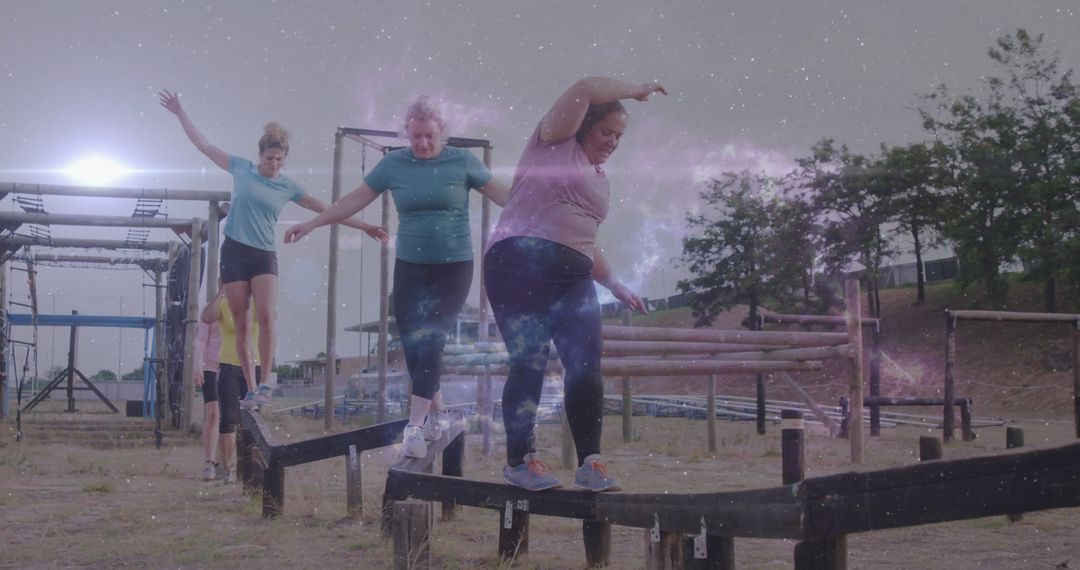 Diverse Group of Women Balancing on Obstacle Course