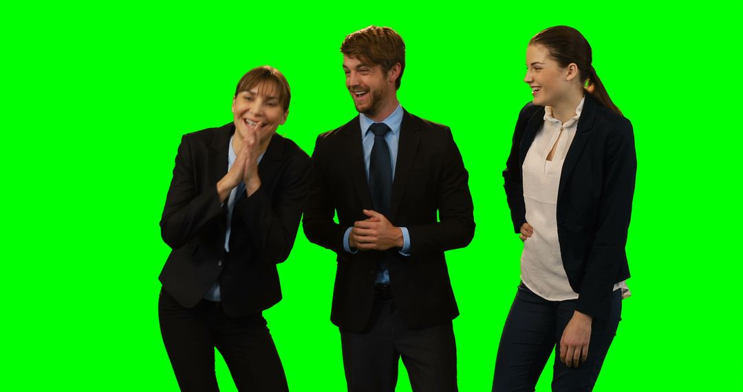 Team Laughing and Bonding in Professional Attire with Green Screen
