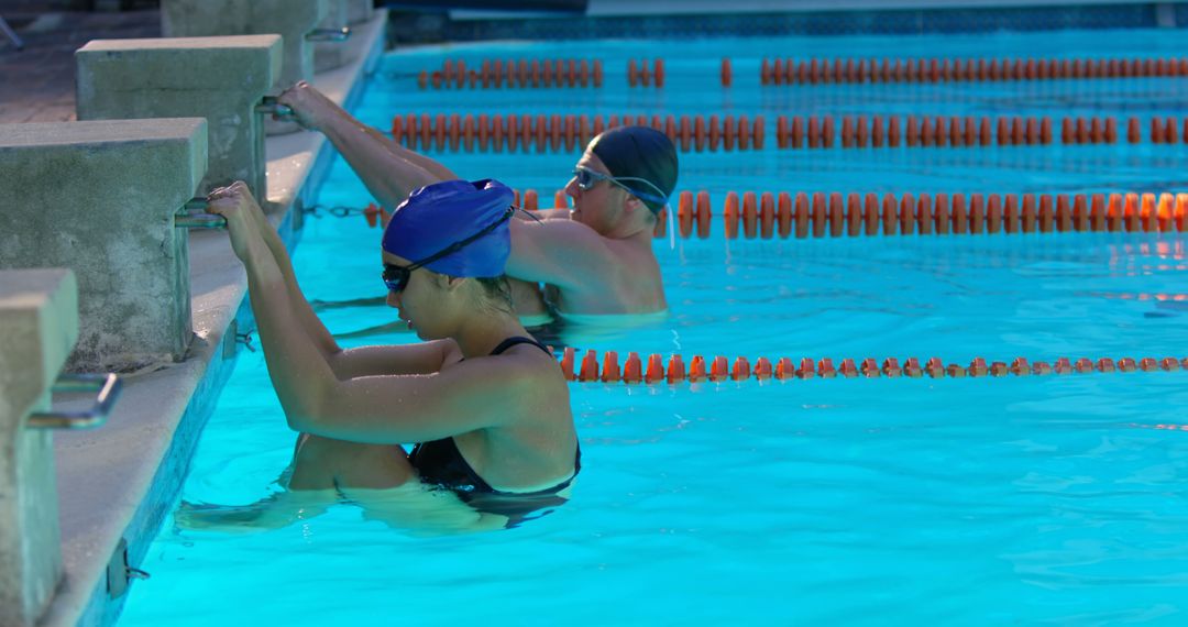 Swimmers Preparing for Race in Competition Pool - Free Images, Stock Photos and Pictures on Pikwizard.com