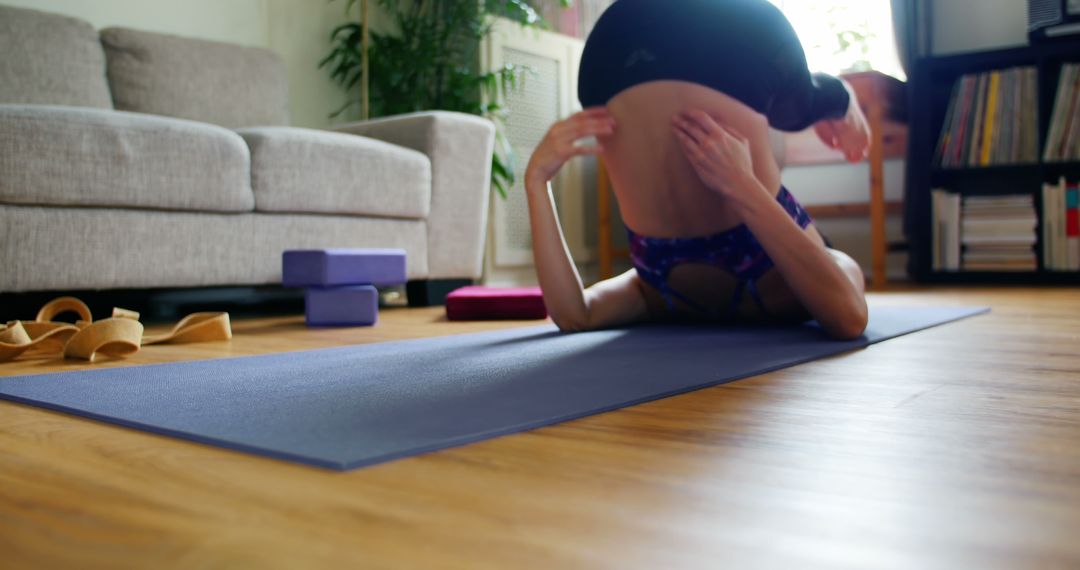 Woman Practicing Yoga at Home in Bright Living Room - Free Images, Stock Photos and Pictures on Pikwizard.com