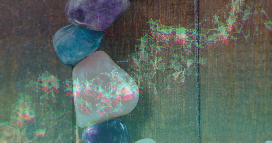 Polished Gemstones with Digital Overlay on Wooden Surface