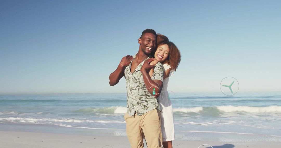 Joyful Couple Hugging on Sunny Beach with Ocean Waves