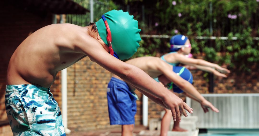 Children Preparing to Dive in Outdoor Pool - Free Images, Stock Photos and Pictures on Pikwizard.com