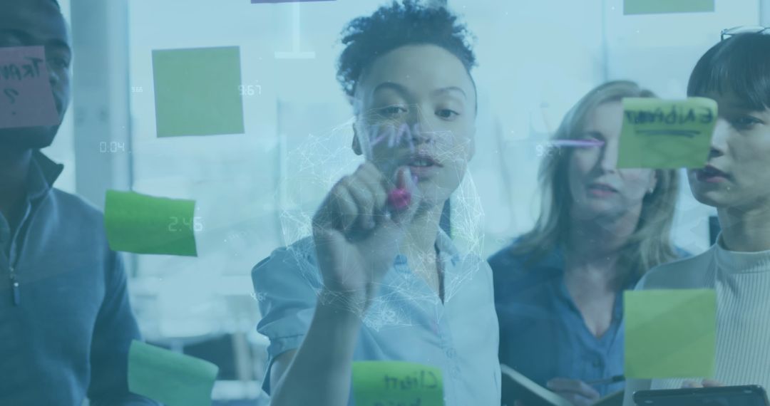 Team Collaborating on High-Tech Business Solutions