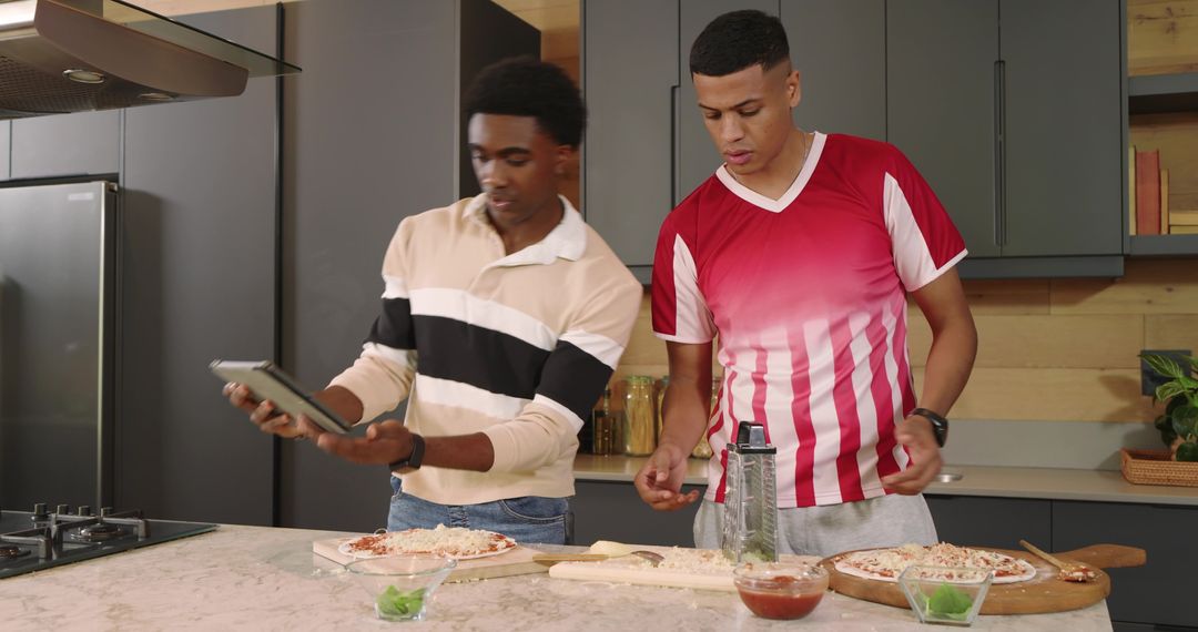 Diverse Friends Making Homemade Pizza with Technology Assist