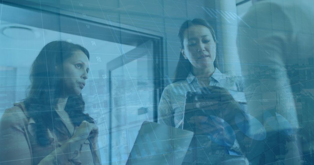 Diverse Team Analyzing Financial Data In Office