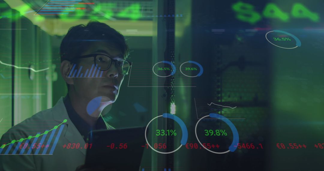 Asian IT Engineer Analyzing Data in Computer Server Room