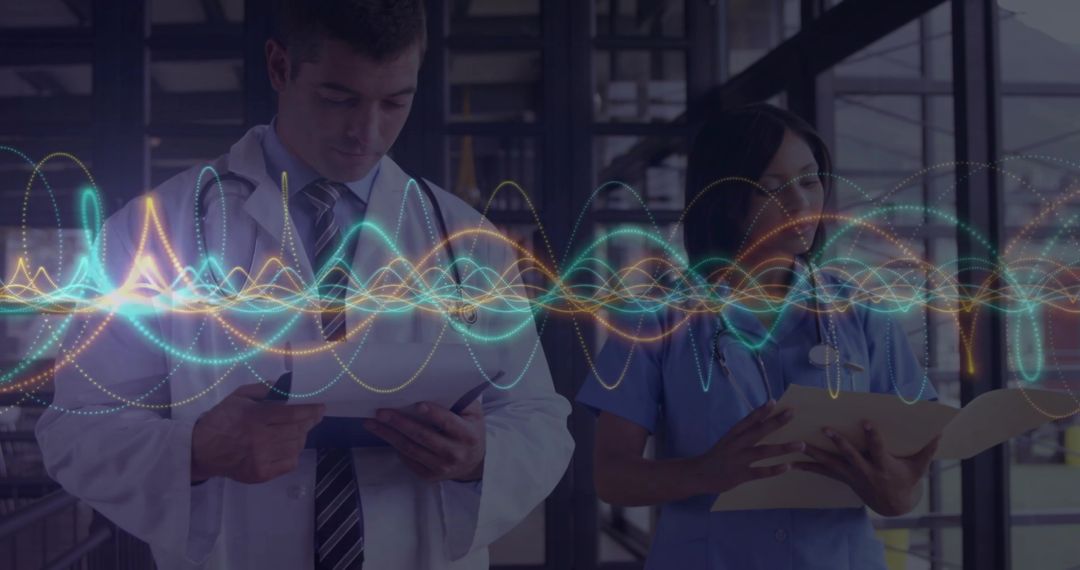 Healthcare Professionals Analyzing Data with Digital Waveform Display
