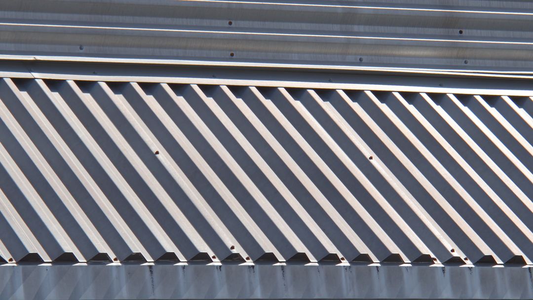 Abstract design patterns of corrugated metal sheet surface