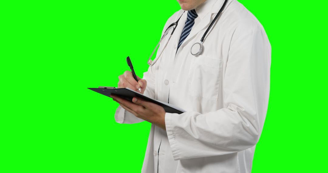 Doctor Writing on Clipboard with Green Screen Background - Free Images, Stock Photos and Pictures on Pikwizard.com