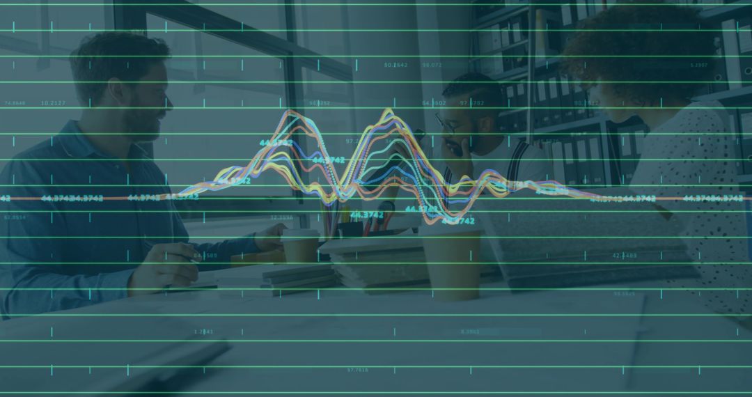 Colleagues Collaborating on Data Overlay in Modern Office