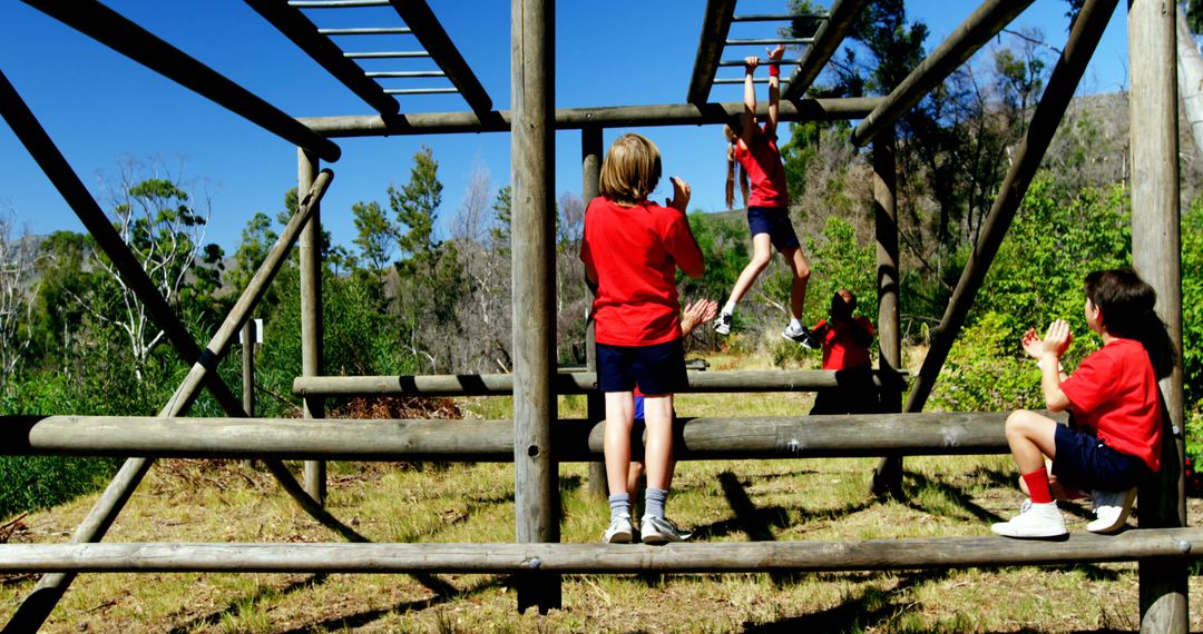 Children Playing on Outdoor Obstacle Course in Sunny Park - Free Images, Stock Photos and Pictures on Pikwizard.com