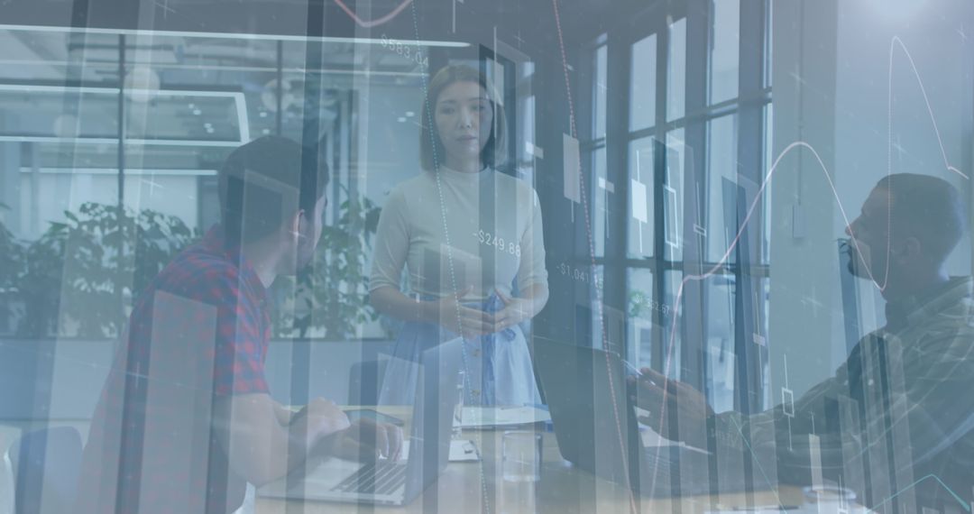 Business Team Collaboration with Futuristic Financial Data Overlay