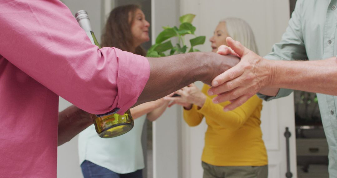 Close-Up of Diverse Friends Shaking Hands - Free Images, Stock Photos and Pictures on Pikwizard.com